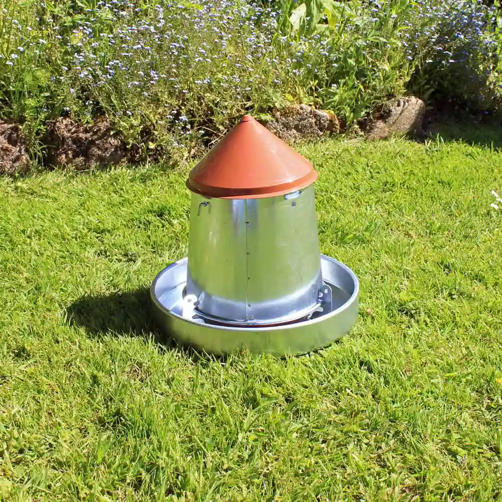 Gaun Galvanised Hanging 5kg Poultry Feeder on grass