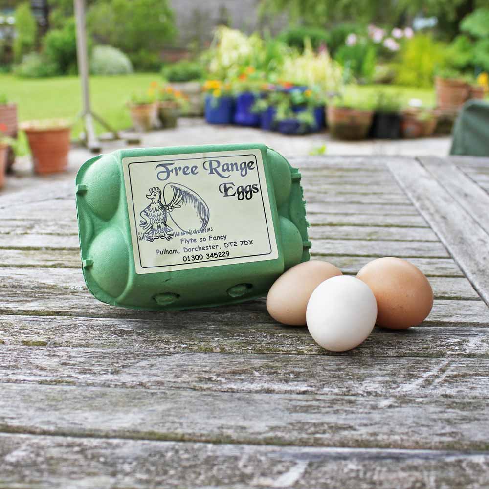 Cream Proud Chicken label for Free Range Eggs on egg box