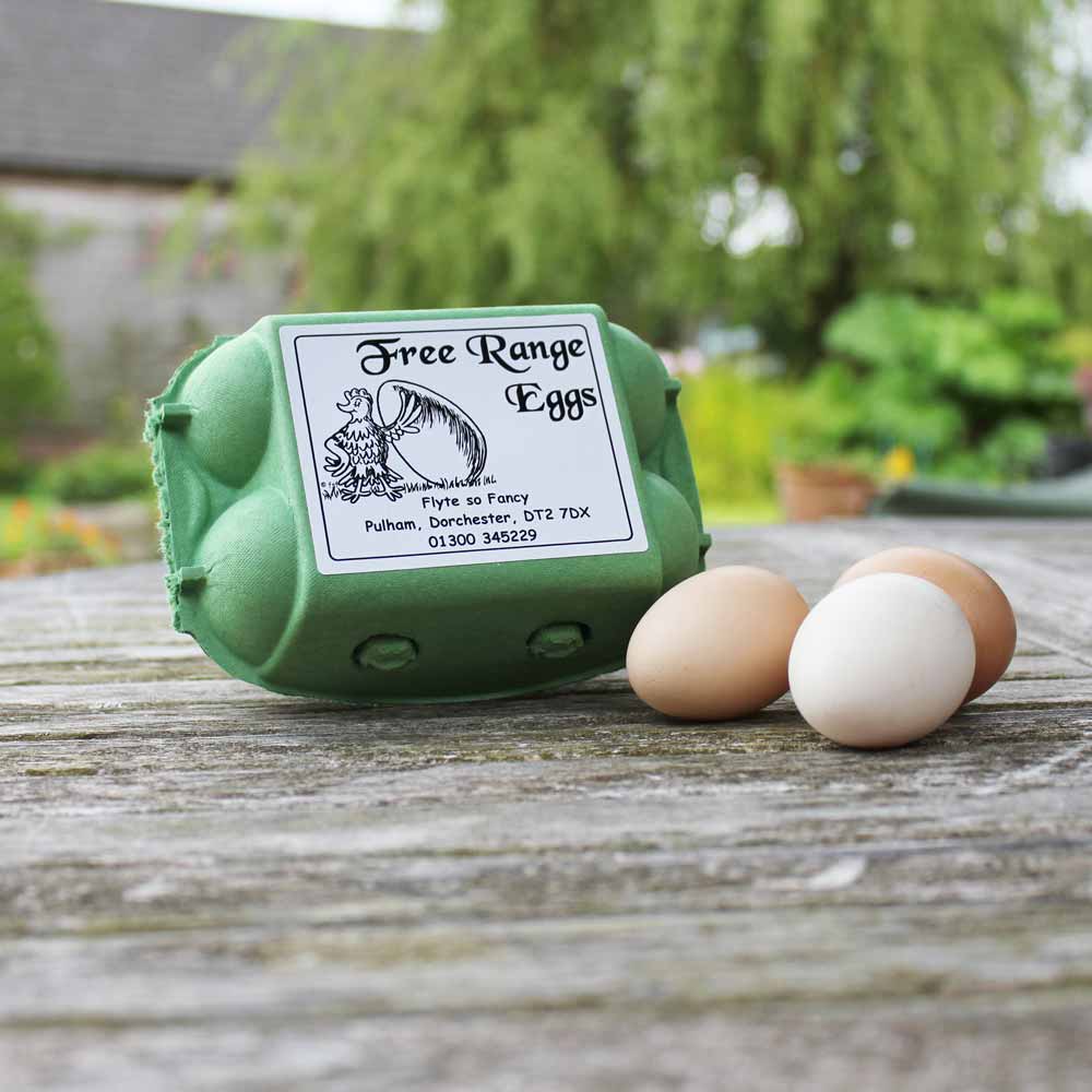 White Proud Chicken label for Free Range Eggs on egg box
