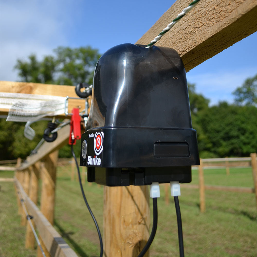 HLB100 Shrike Battery Energiser on a fence
