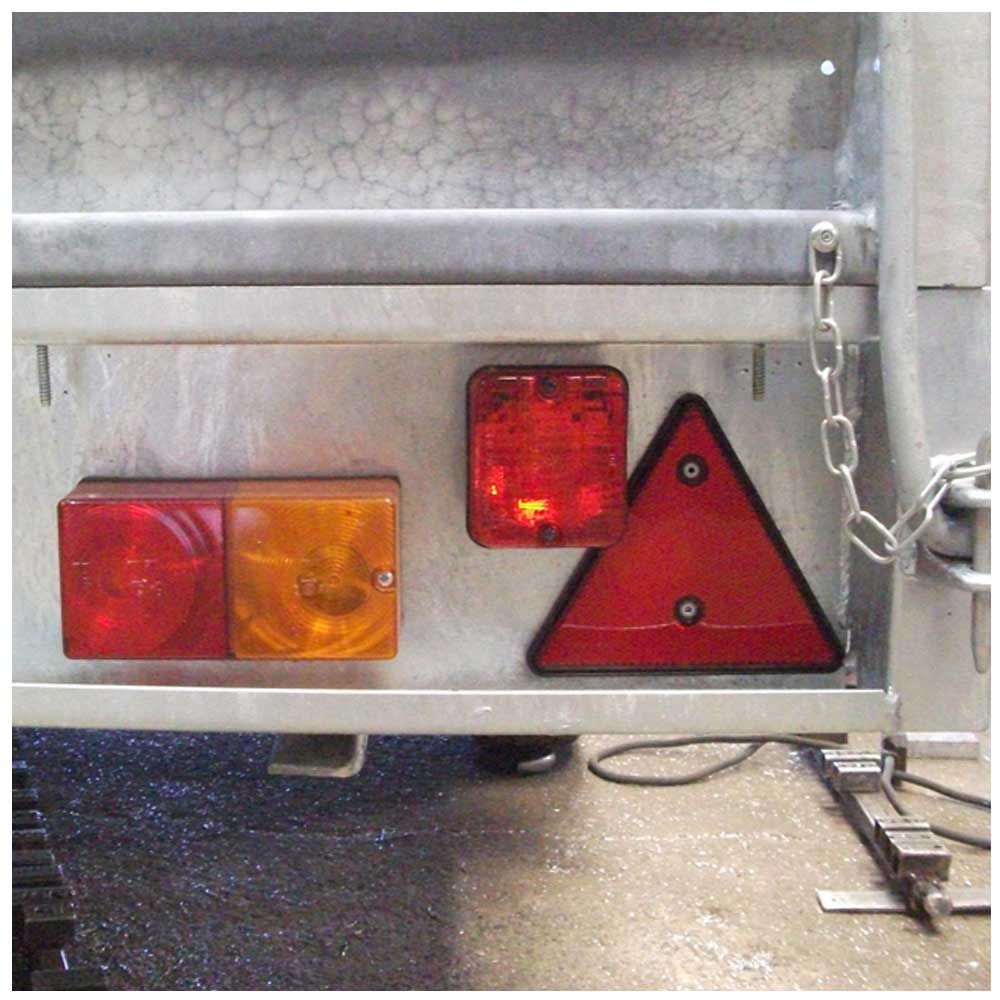 Red Triangular Reflector on rear of trailer