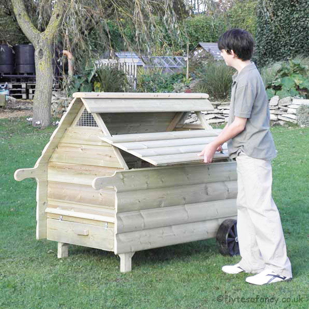 Sliding the roof into place Dorset Stroller Chicken Coop