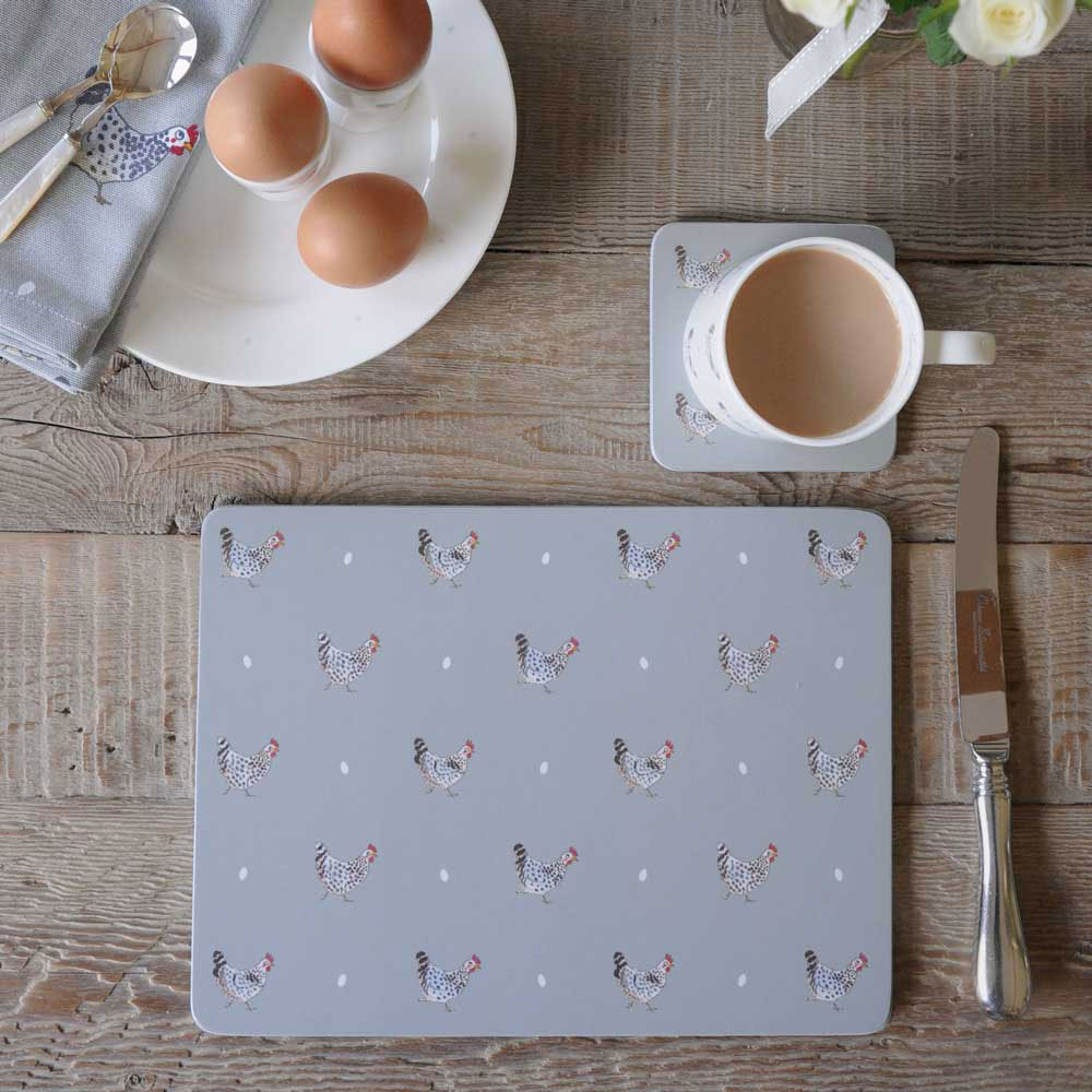 Table setting with chicken placemats