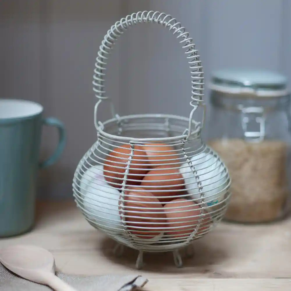 Small Round Wire Egg Basket in Chalk White with eggs