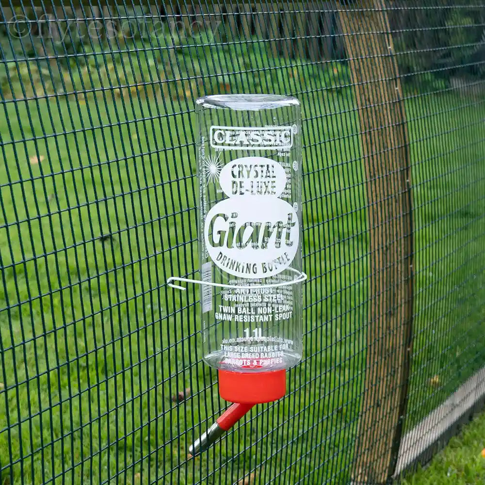 Classic Deluxe Pet Drinking Bottle on the mesh cage
