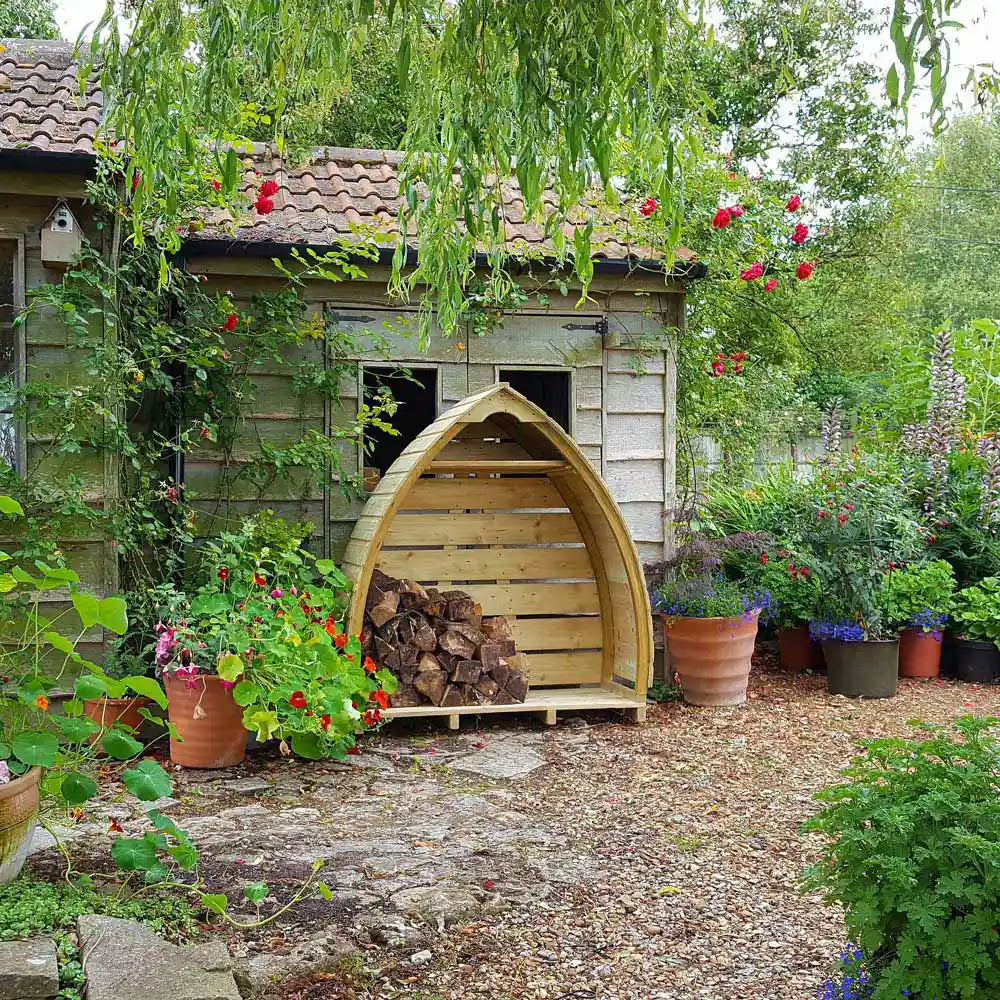 Little Arch Log Store, front view