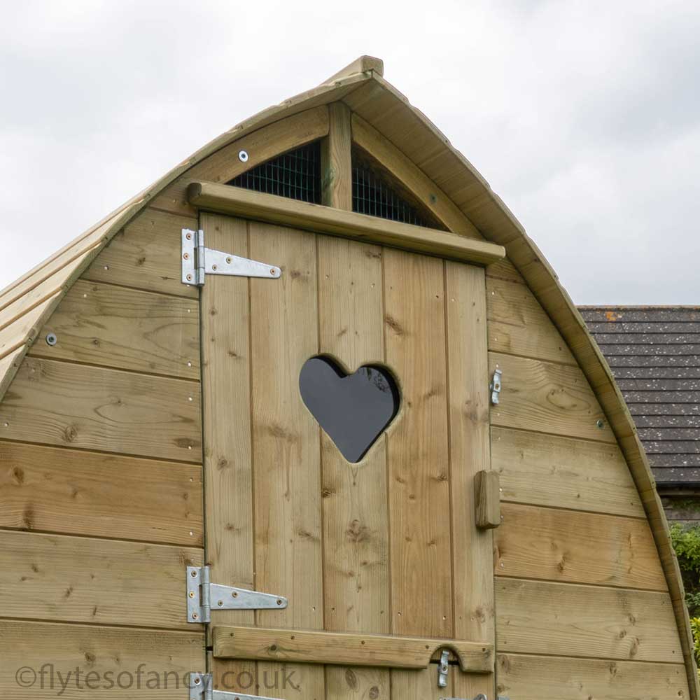 Heart in the door of Arched Pygmy Goat House with Stable Door